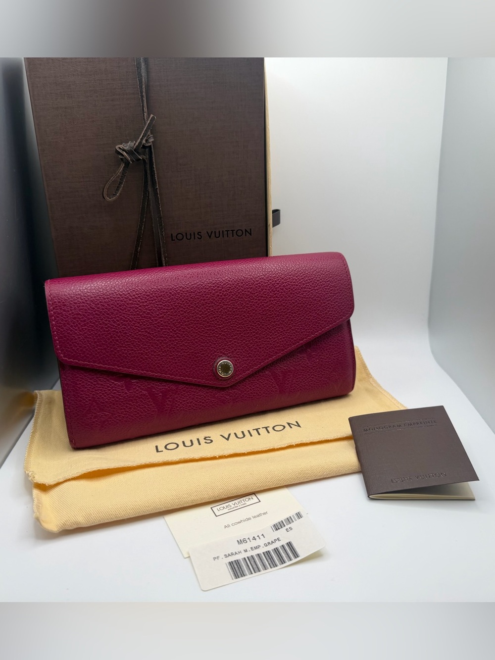 Louis Vuitton Monogram
Empreinte Sarah Long Wallet Magenta / Grape Leather